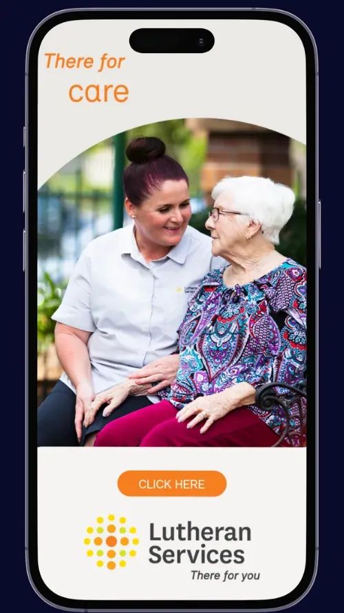 A middle-aged woman sitting with an older lady, providing care