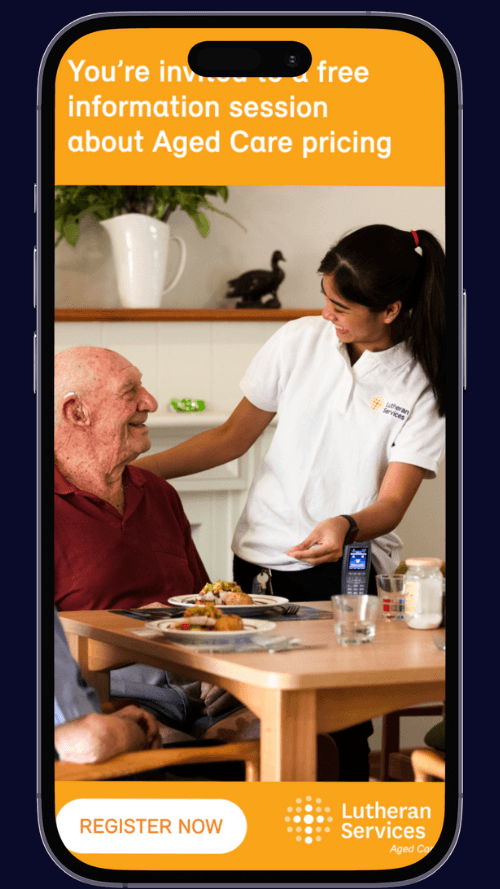 A young woman providing aged care to an older man