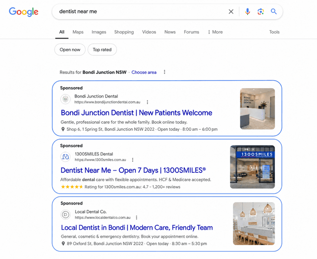 Google search results showing sponsored ads for local dentists.