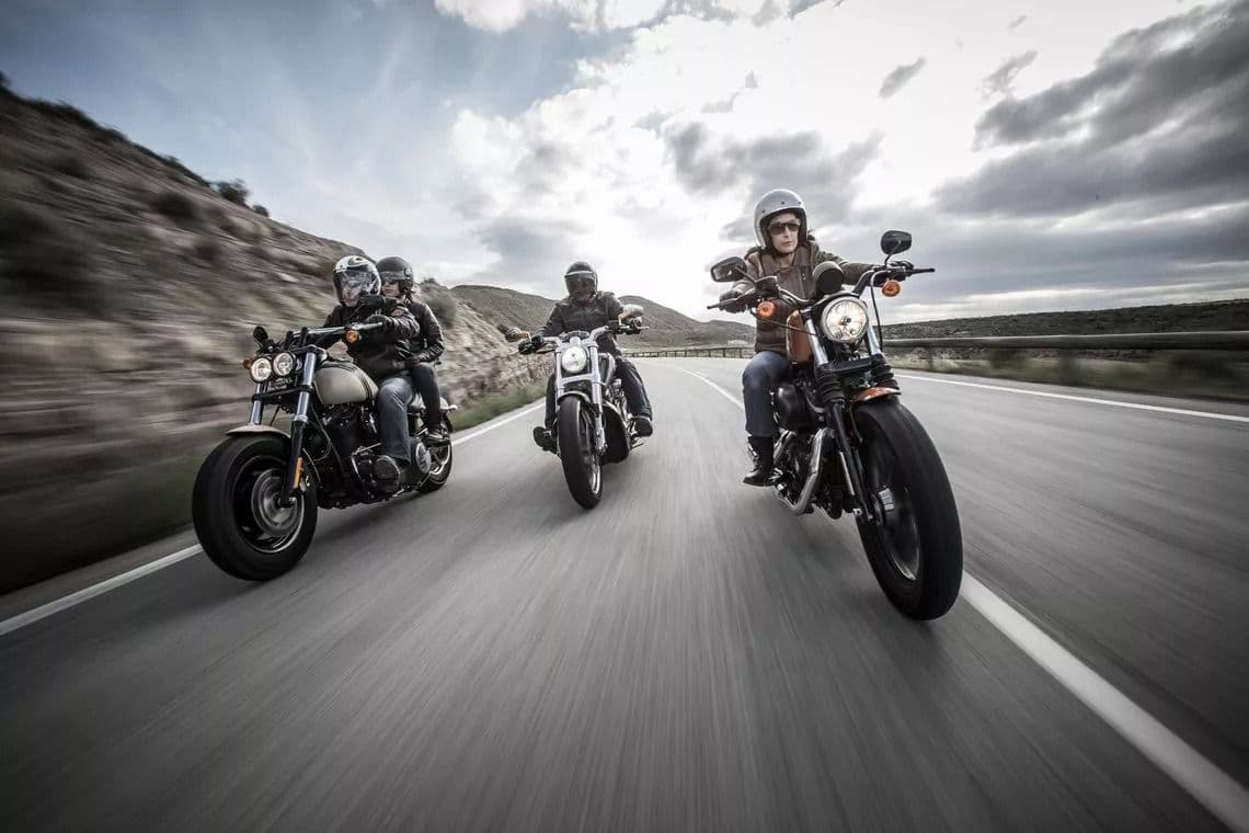 Three Harley-Davidson riding towards the camera front on